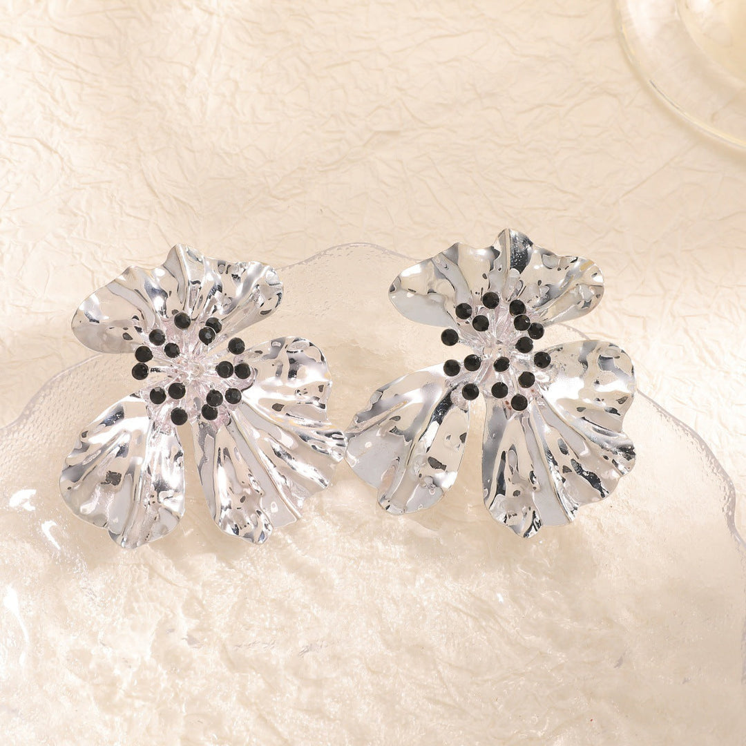 Women’s metal flower earrings with sparkling red accents All Fashion
