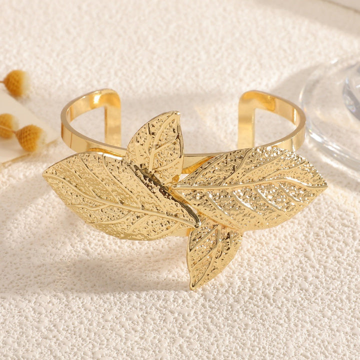 Ladies' bangle with artistic leaf design All Fashion