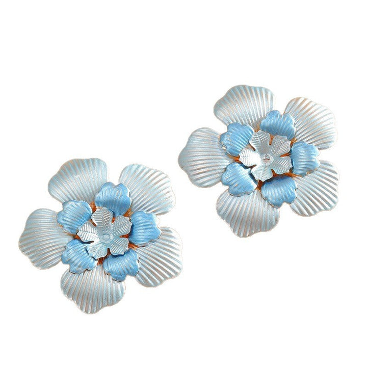 Ladies' flower earrings with intricate design and glossy accents All Fashion