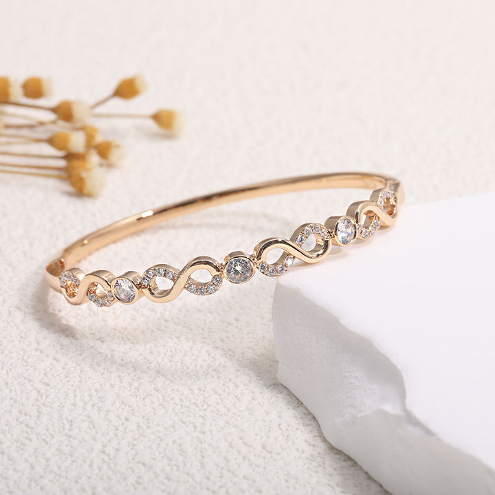 Ladies bracelet with elaborate infinity symbol and sparkling zirconia All Fashion