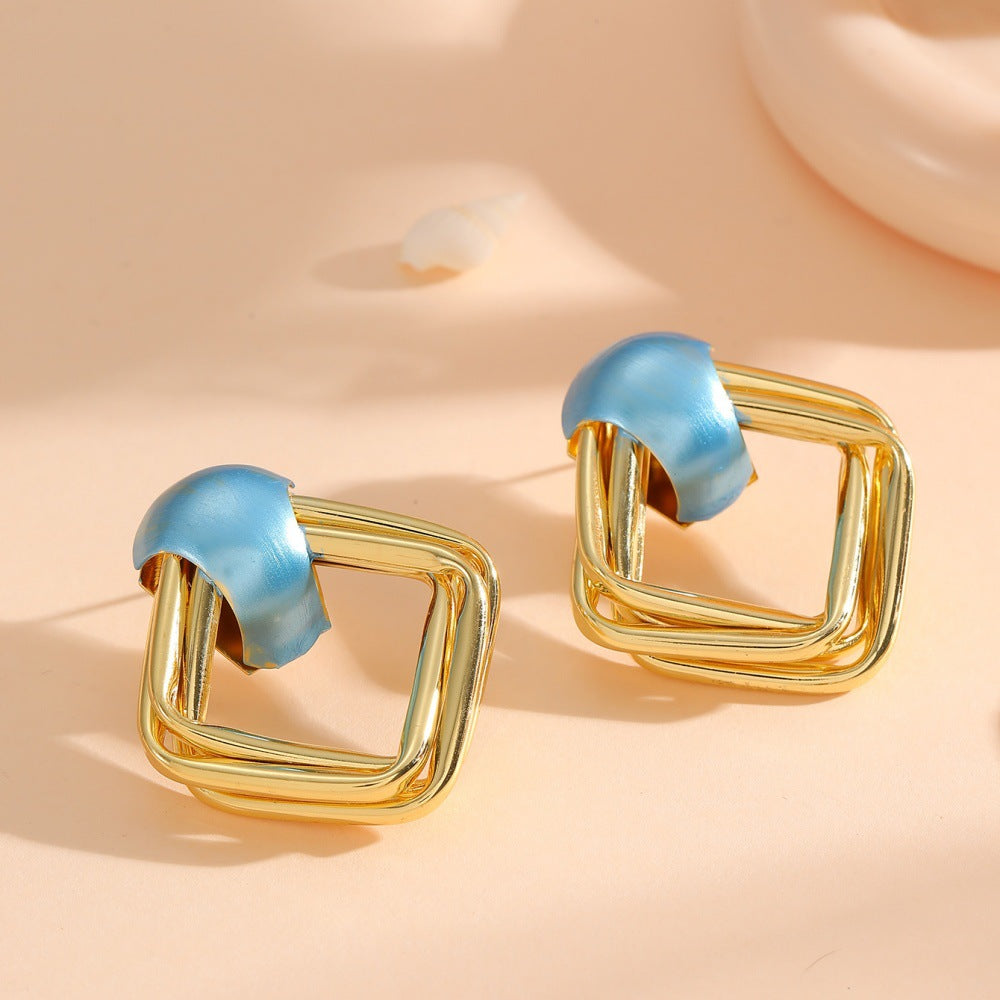 Women modern earrings with asymmetrical design All Fashion