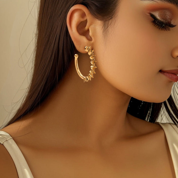 Ladies hoop earrings with intricate structures All Fashion