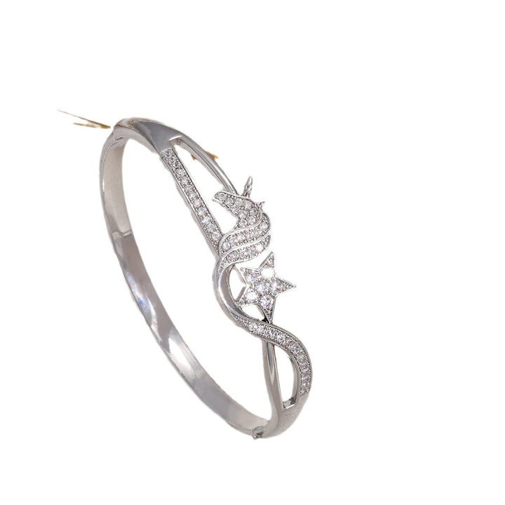 Women's bangle with elegant infinity pattern and sparkling zirconia All Fashion