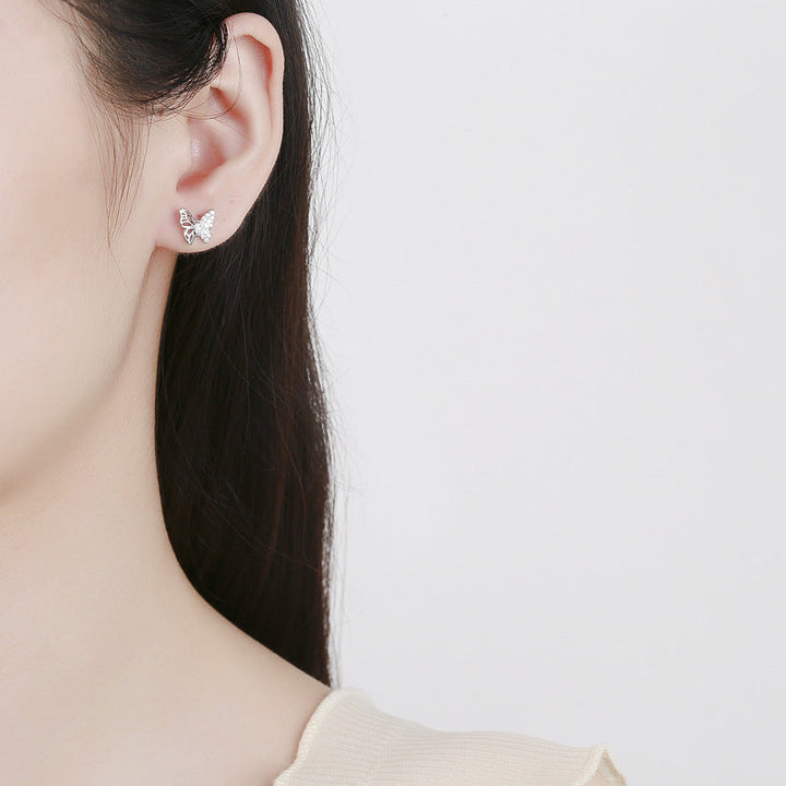 Ladies earrings in an elegant butterfly design with sparkling zirconia All Fashion