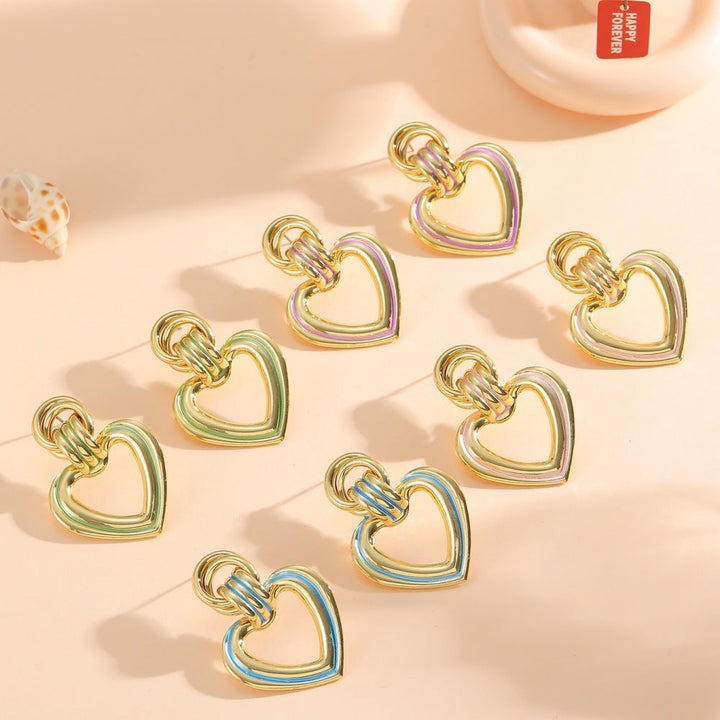 Women’s earrings in modern heart design All Fashion