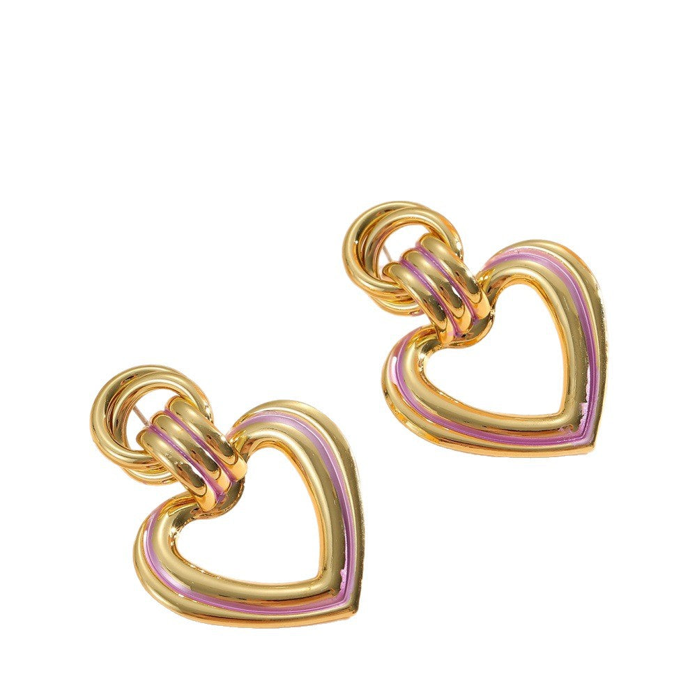 Women’s earrings in modern heart design All Fashion