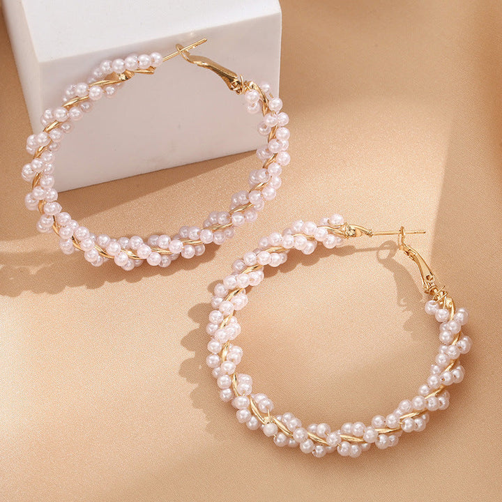 Ladies hoop earrings with luxurious pearl accents and elegant, twisted design All Fashion