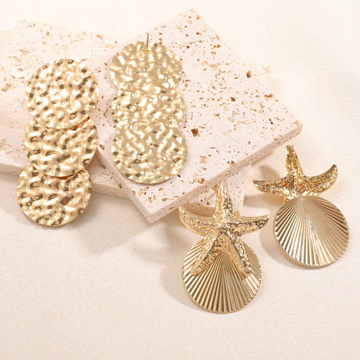 Women's ear clips in luxurious shell and starfish design All Fashion