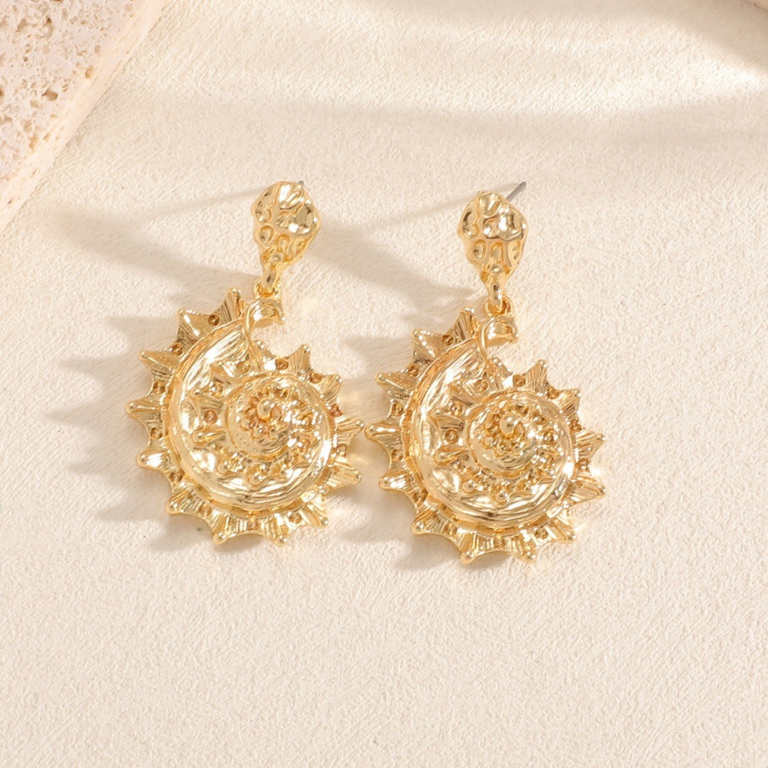 Ladies earrings in shell design All Fashion