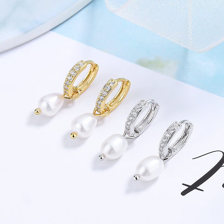 Ladies earrings with elegant zirconia decorations and pearl pendants All Fashion