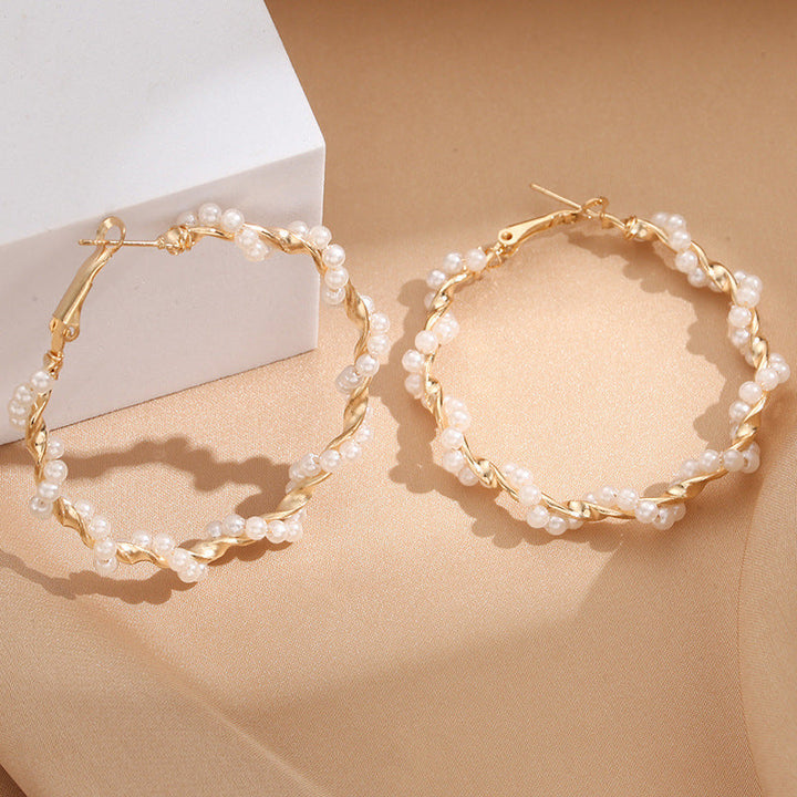 Ladies hoop earrings with luxurious pearl accents and elegant, twisted design All Fashion