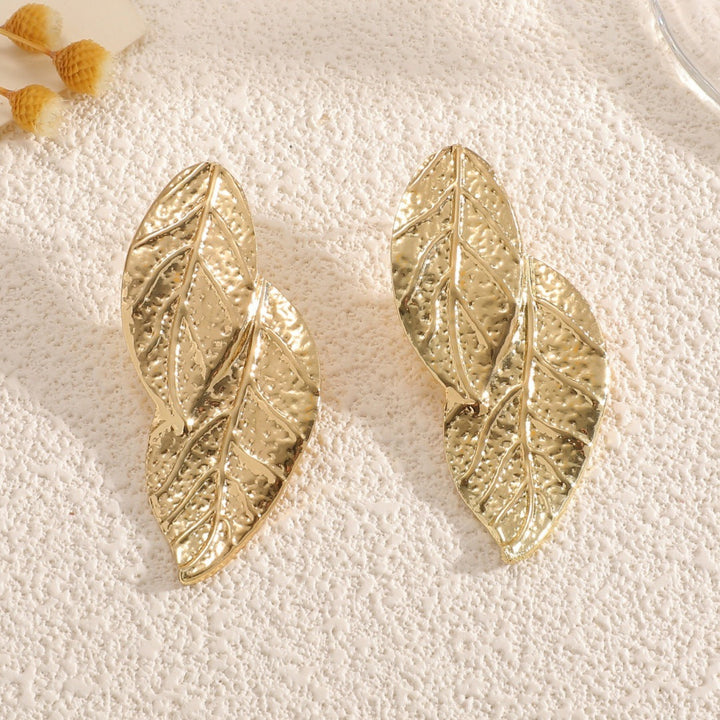 Ladies' bangle with artistic leaf design All Fashion