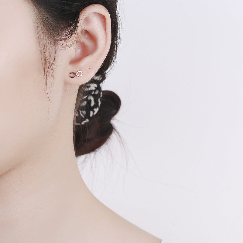 Ladies earrings in infinity design made of high-quality material All Fashion