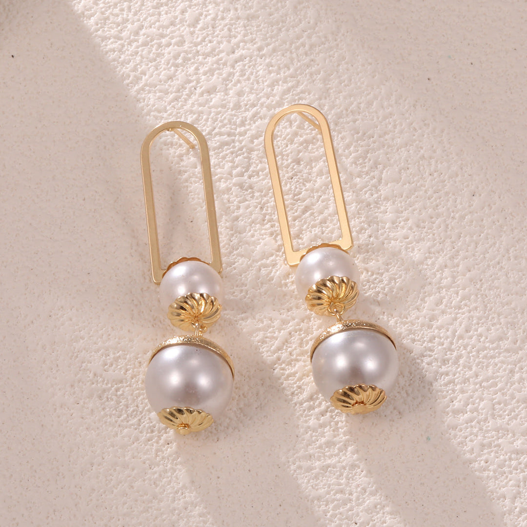 Ladies earrings with elegant pearl design All Fashion
