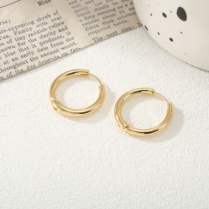 Women's hoop earrings with modern, textured design All Fashion