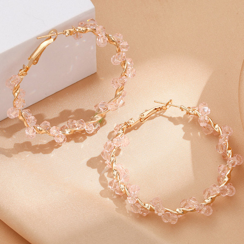Ladies hoop earrings with luxurious pearl accents and elegant, twisted design All Fashion