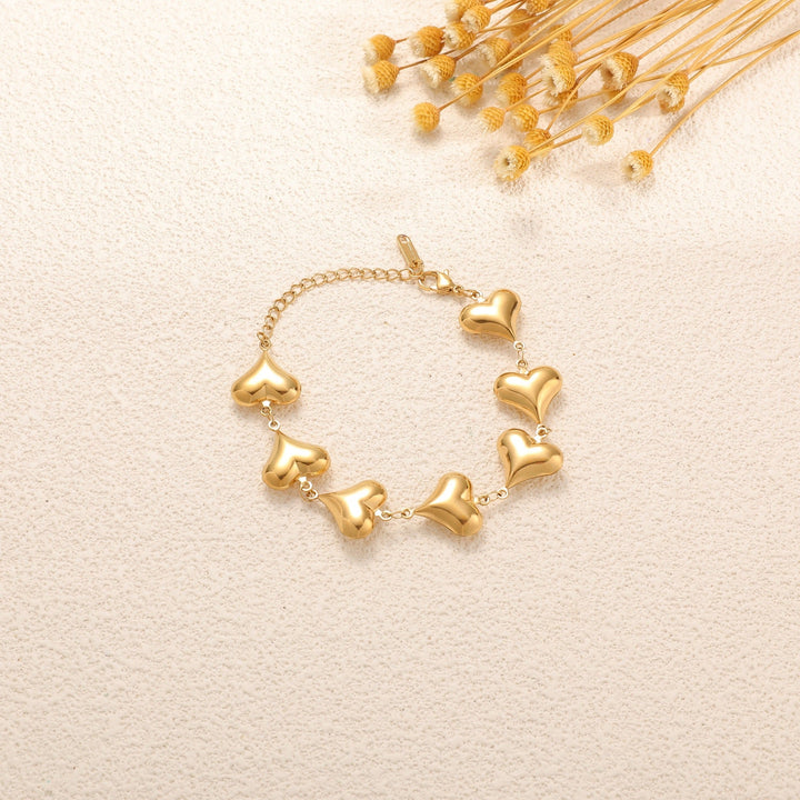 Ladies' bracelet with elegant heart design and fine link chain All Fashion