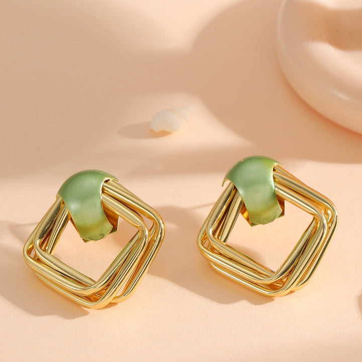 Women modern earrings with asymmetrical design All Fashion