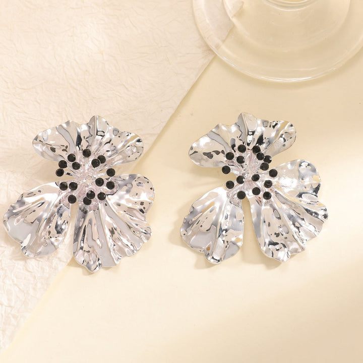 Women’s metal flower earrings with sparkling red accents All Fashion
