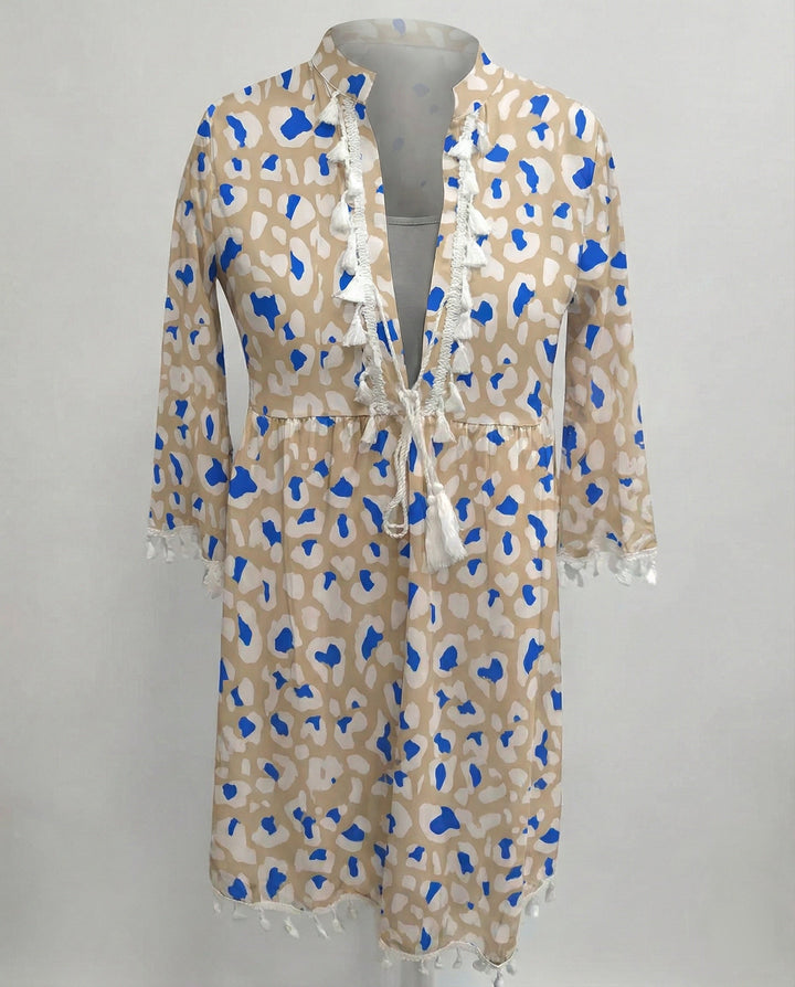 Women's beach dress with high collar and romantic floral pattern